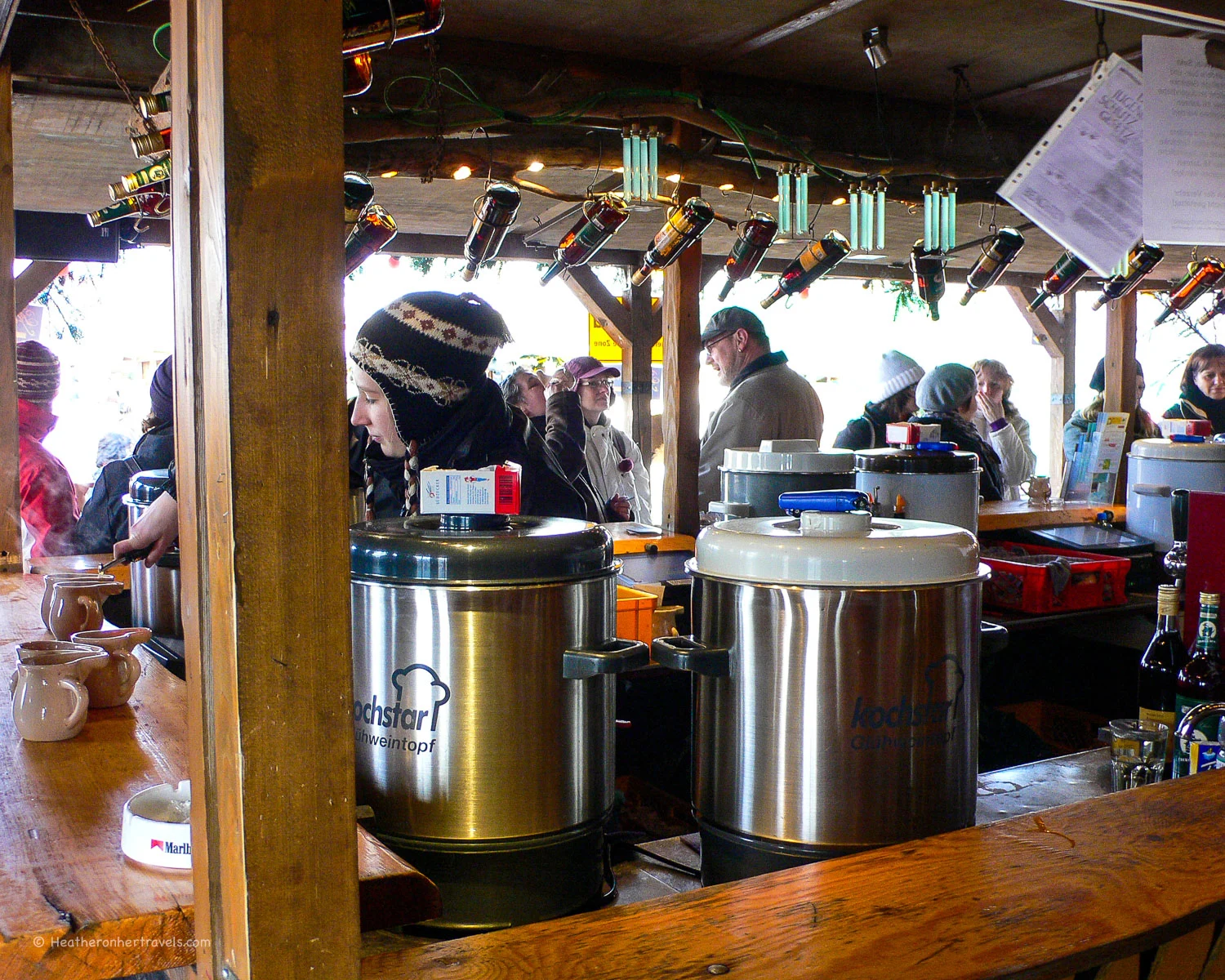 Serving Feuerzangenbowle at Tollwood Festival in Munich