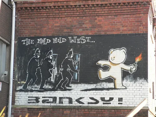 Banksy Mural The Mild Mild West on Stokes Croft, Bristol Photo: Heatheronhertravels.com